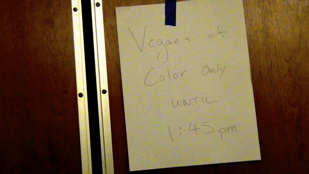 SIGN:  "Vegans of Color Only!"